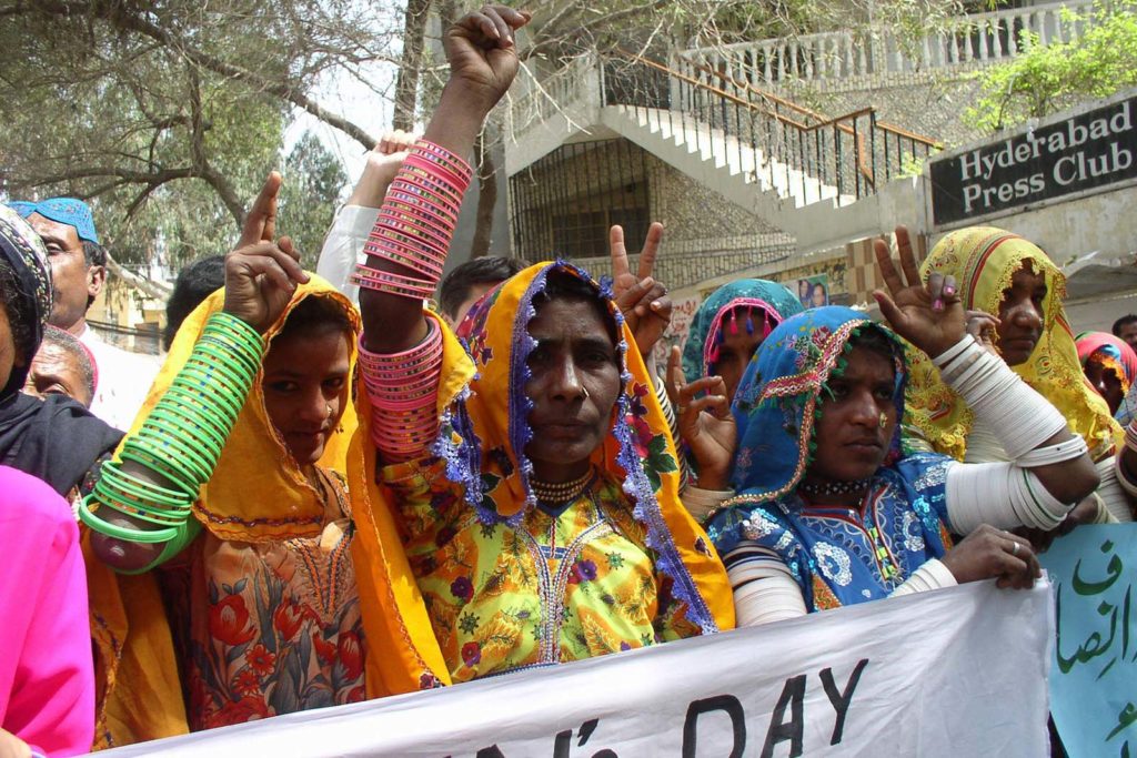 Pakistan villagers demanding women's empowerment ahead of the International Women Day in Hyderabad near Karachi, Pakistan on March. 7, 2008. Pakistan will also observe the International Womens Day with other nations on Saturday.(AP Photo/Pervez Masih)